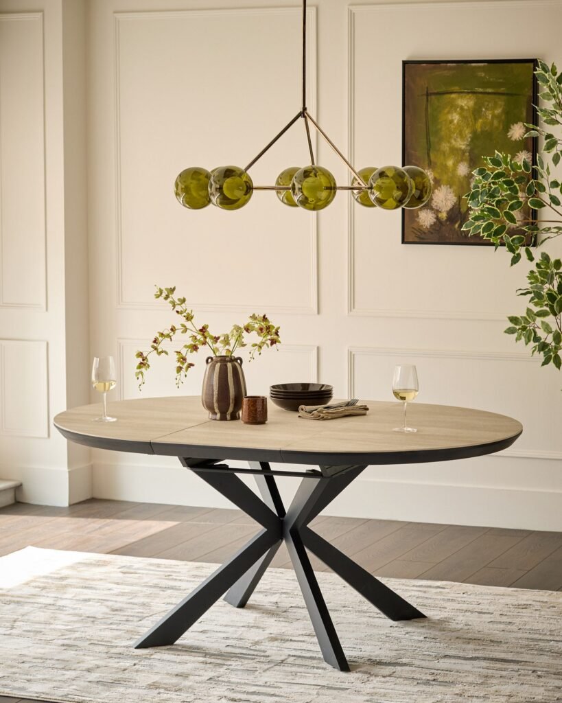 Dusk England Hayden natural travertine ceramic 4-6 extending round dining table Front