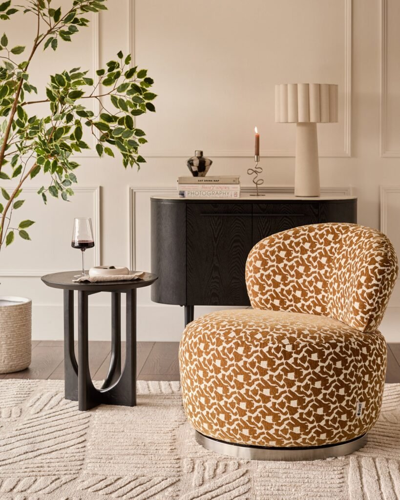 Leda ochre abstract Dusk Scotland fabric swivel accent chair Front