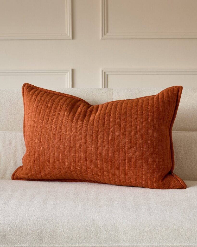 Dusk England Sloane rust medium cushion Front